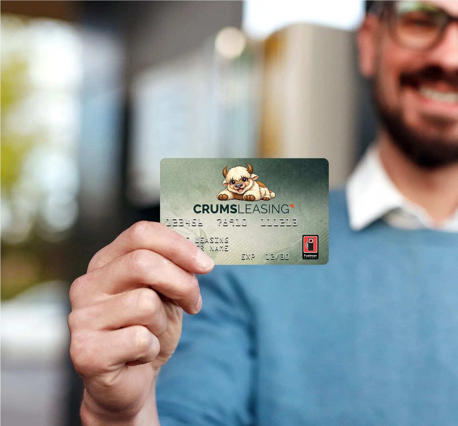 Fleet manager holding the CRUMS Leasing fuel card